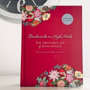 Backwards in High Heels: The Impossible Art of Being Female